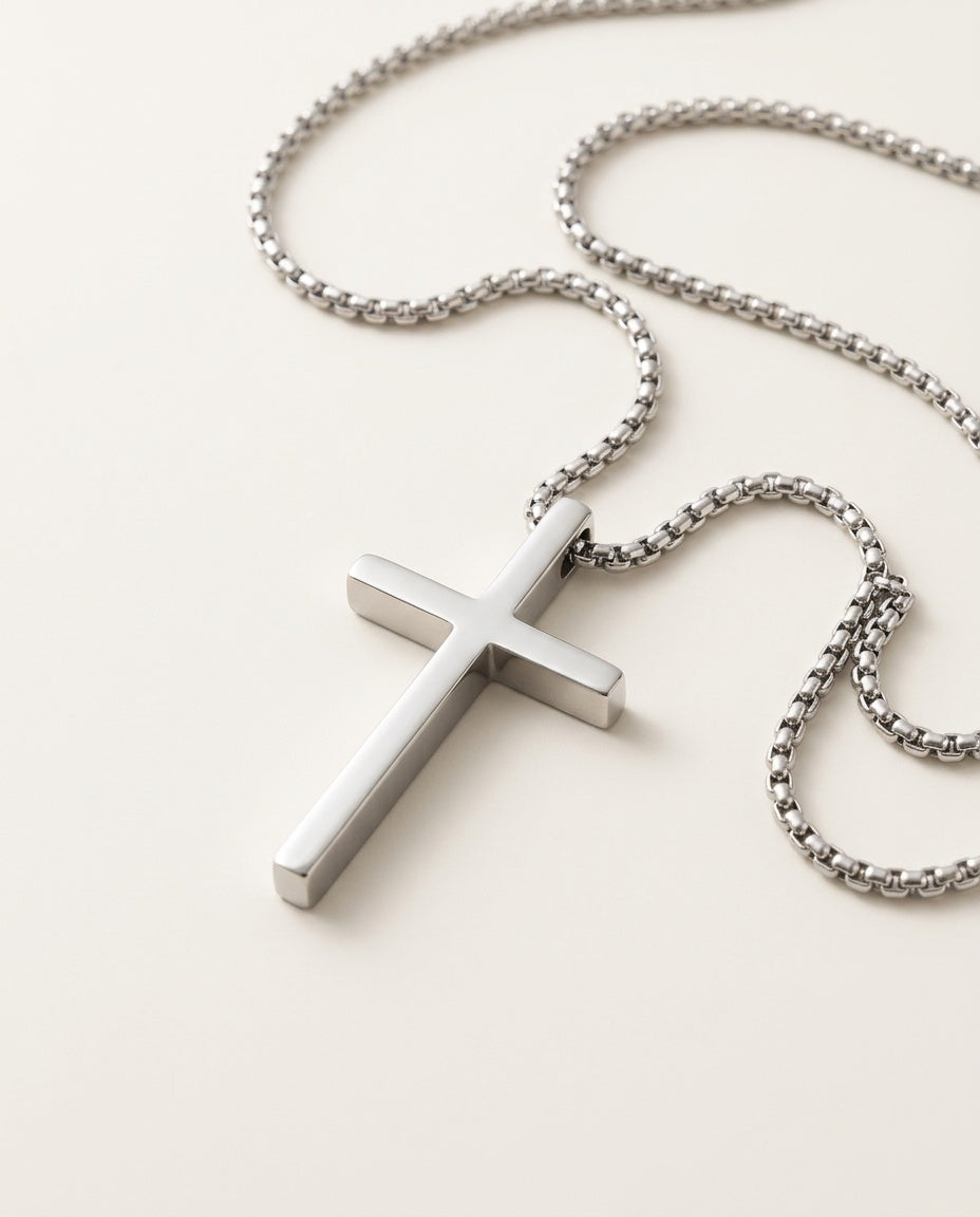 Men's cross necklace in polished stainless steel, packshot
