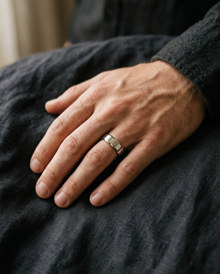 Men's stainless steel band ring worn on the ring finger
