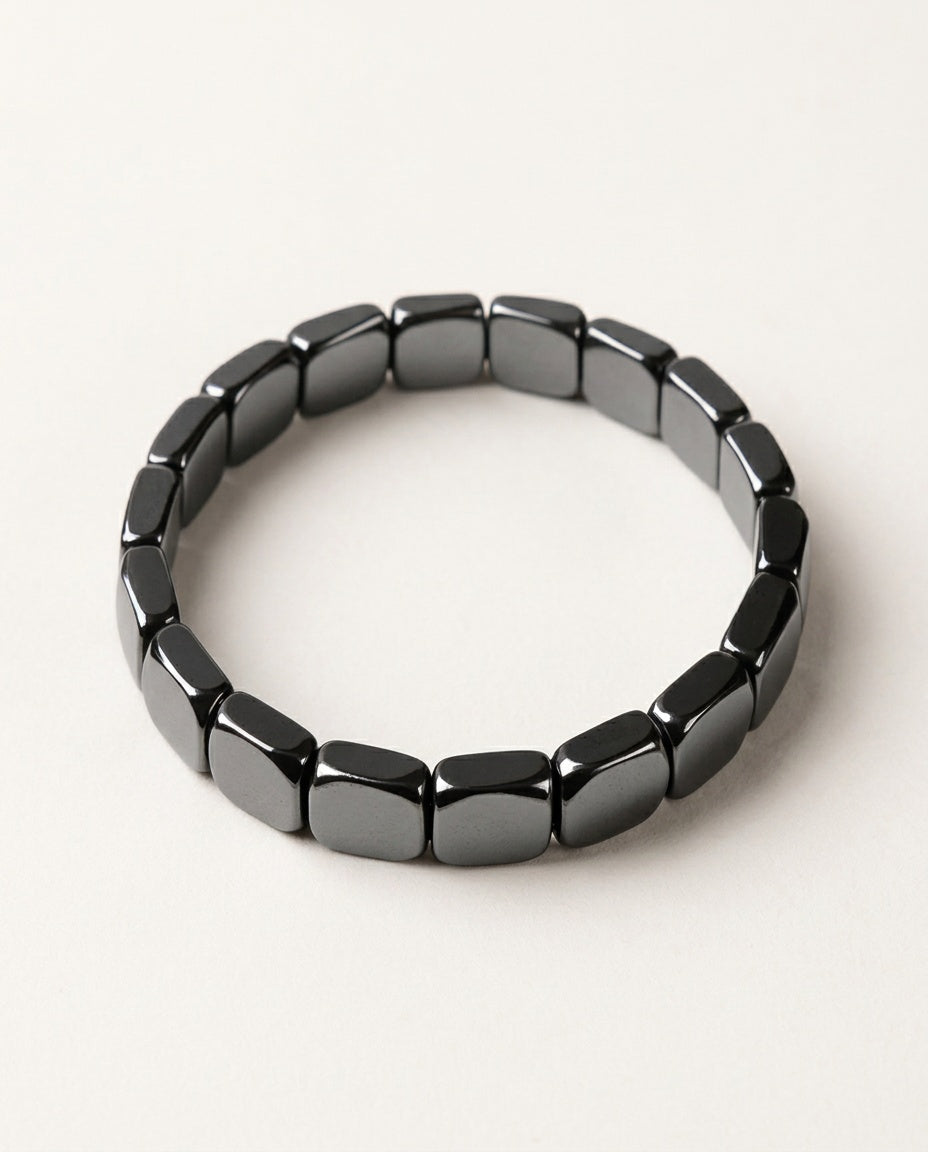 Bracelet hématite à perles noires polies aux reflets métalliques