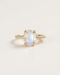 Moonstone ring with an oval stone and zircon band, packshot