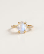Moonstone ring with an oval stone and zircon band, packshot