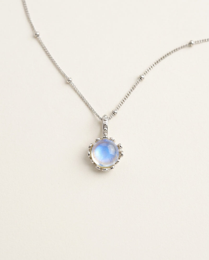 Moonstone necklace with a round blue-glow stone on a fine silver chain