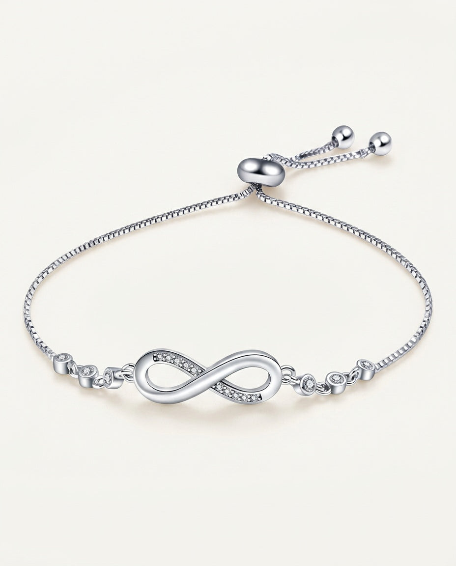 Silver infinity bracelet with zircon-set symbol on a fine chain