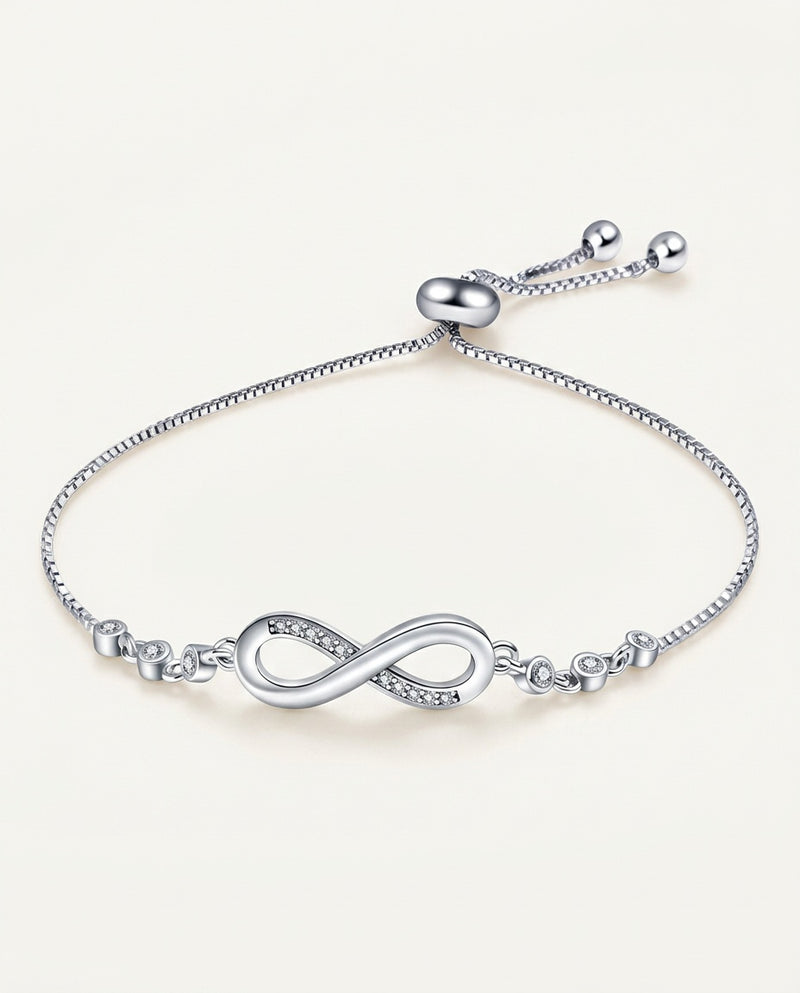 Silver infinity bracelet with zircon-set symbol on a fine chain