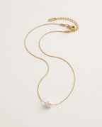 Pearl charm necklace with a freshwater pearl on a fine gold-tone chain
