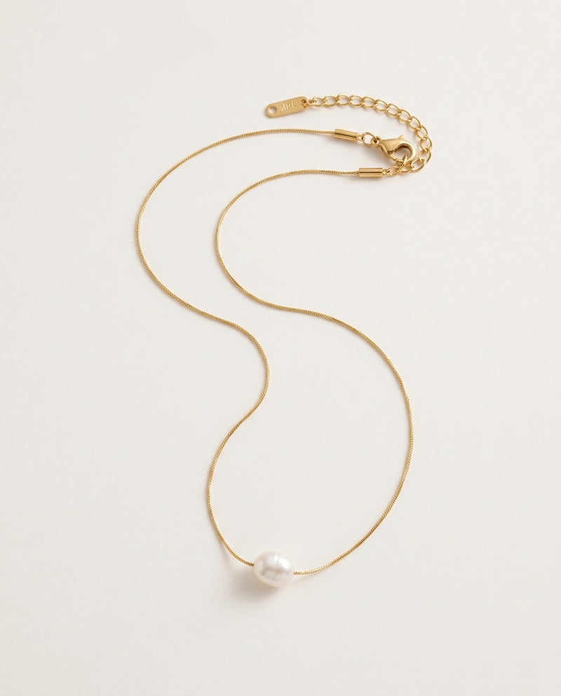 Pearl charm necklace with a freshwater pearl on a fine gold-tone chain