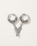 Mens dangle earrings with a stainless steel feather on an engraved hoop, packshot