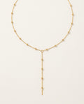 Gold lariat necklace with a fine Y chain and delicate central drop
