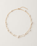Pearl choker with small white pearls on a fine gold chain