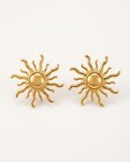 Gold sun earrings, sun stud style, on a white background