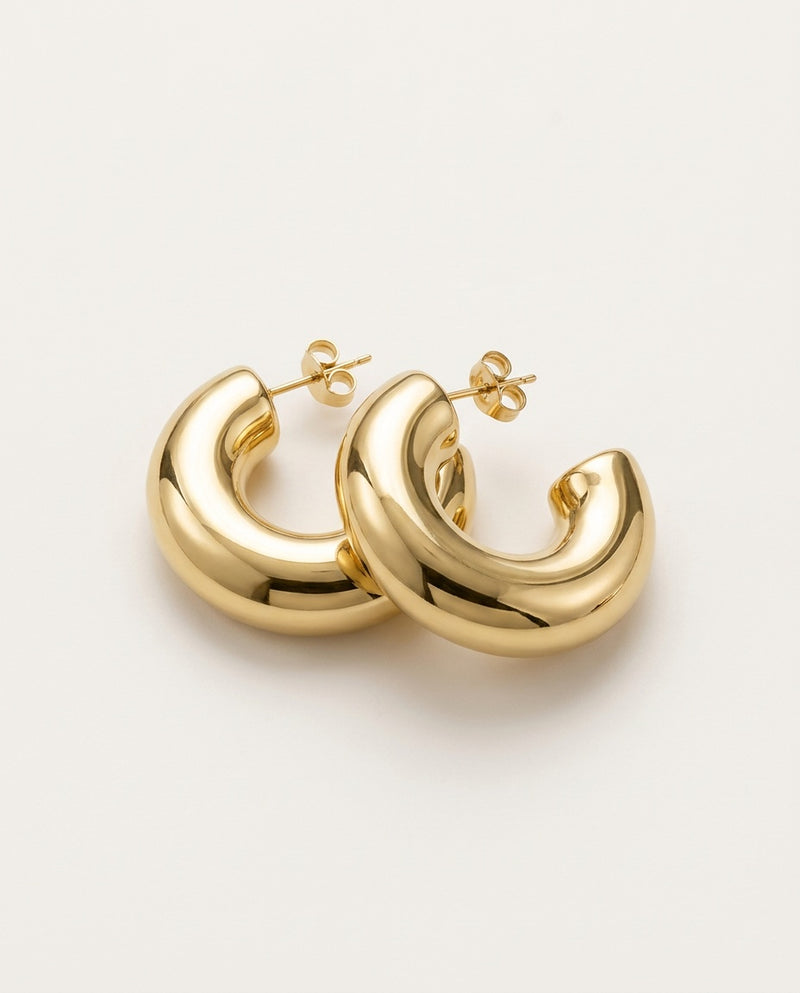 Chunky hoop earrings in gold with thick round tube