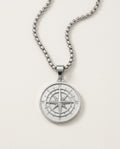 Medallion necklace with a round compass pendant in stainless steel