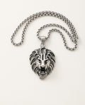 Lion pendant in gold with roaring lion head and detailed mane