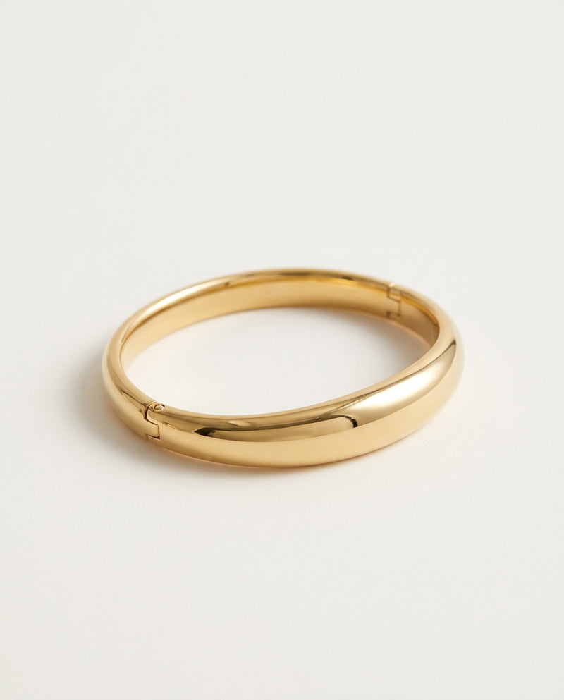 Polished cuff bracelet in gold-tone stainless steel