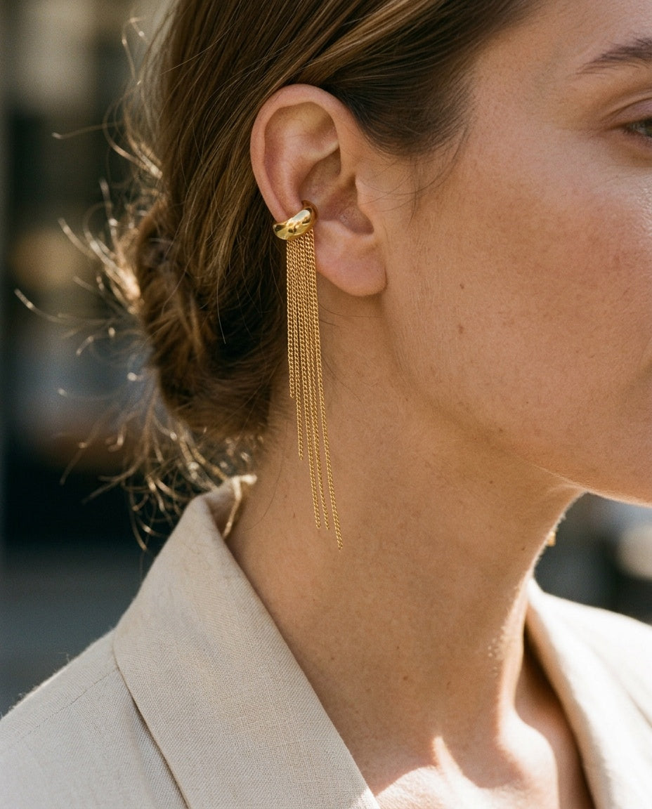 Ear cuff chain worn with hair tied back