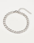Gold curb link bracelet with flat polished links and lobster clasp