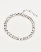 Gold curb link bracelet with flat polished links and lobster clasp