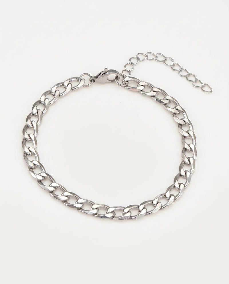 Gold curb link bracelet with flat polished links and lobster clasp