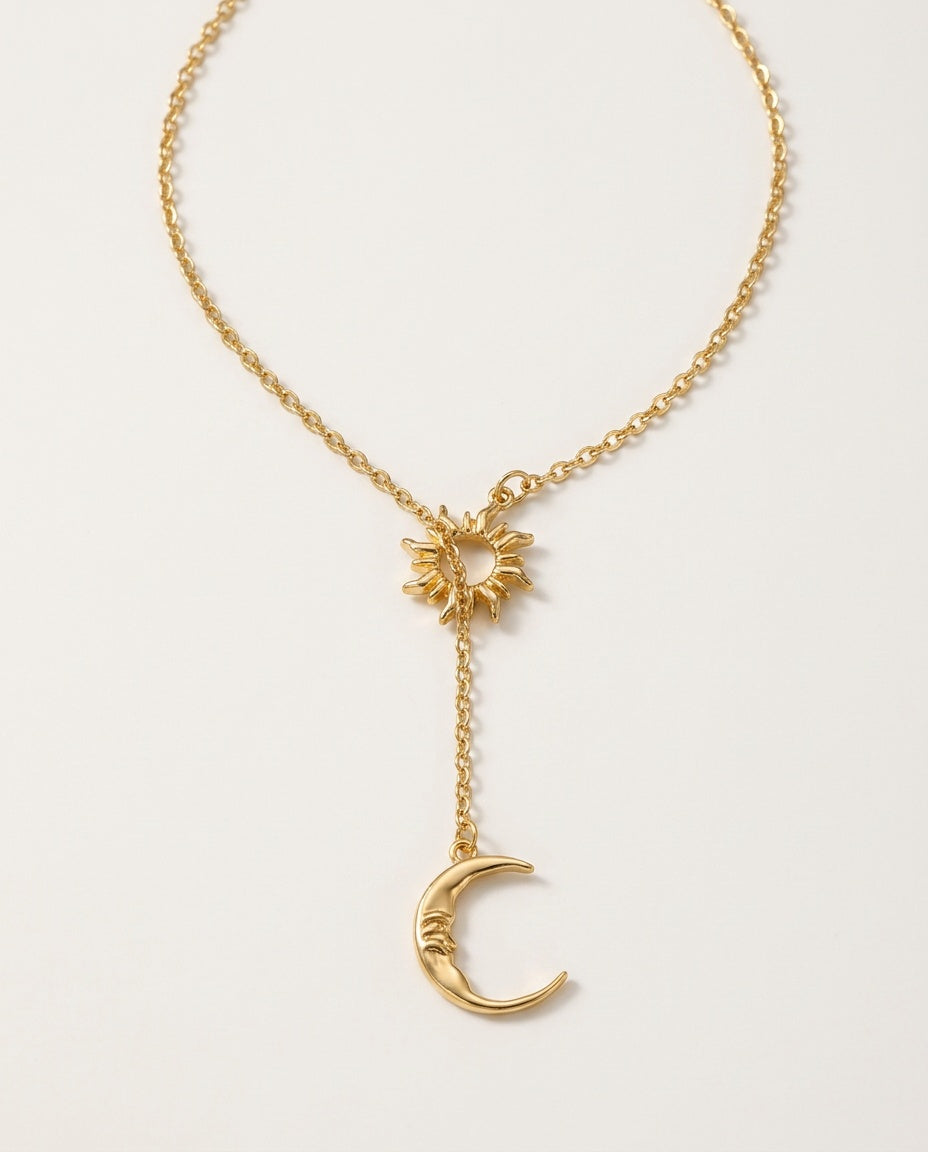 Moon necklace with a small sun and a crescent moon on a Y-shaped chain
