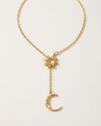 Moon necklace with a small sun and a crescent moon on a Y-shaped chain