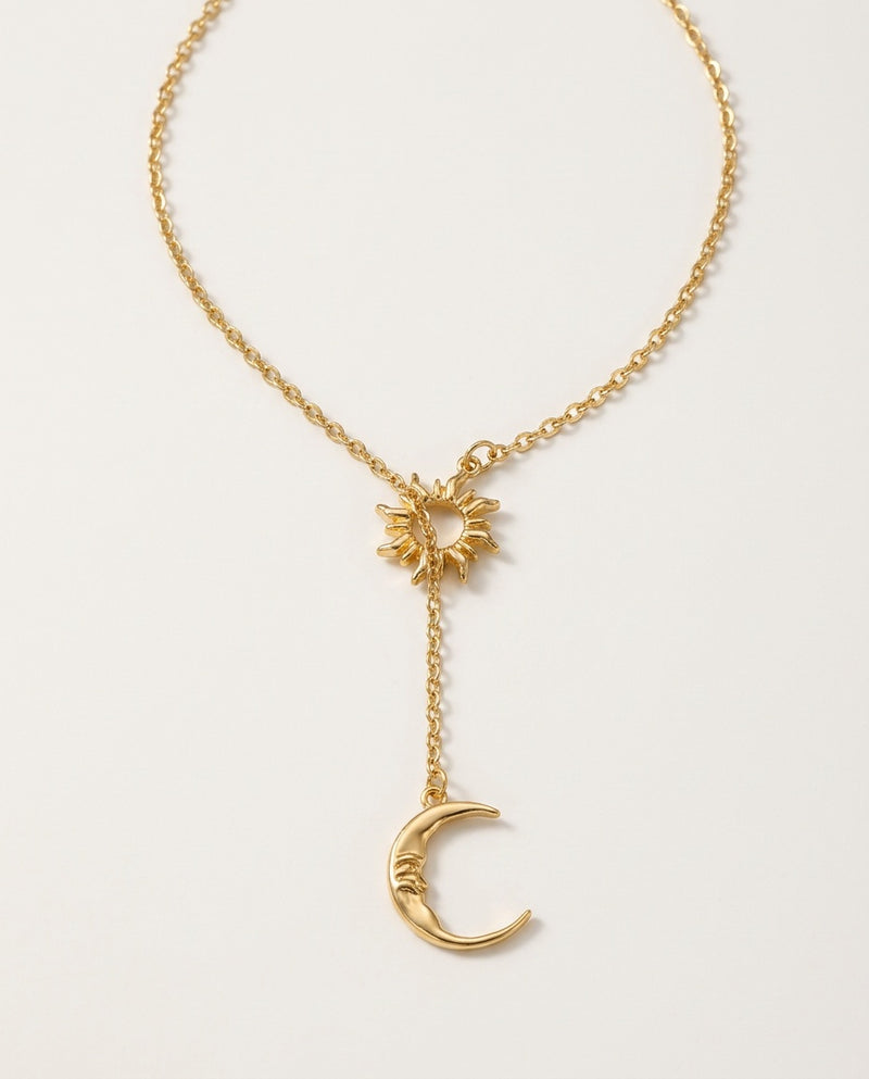 Moon necklace with a small sun and a crescent moon on a Y-shaped chain
