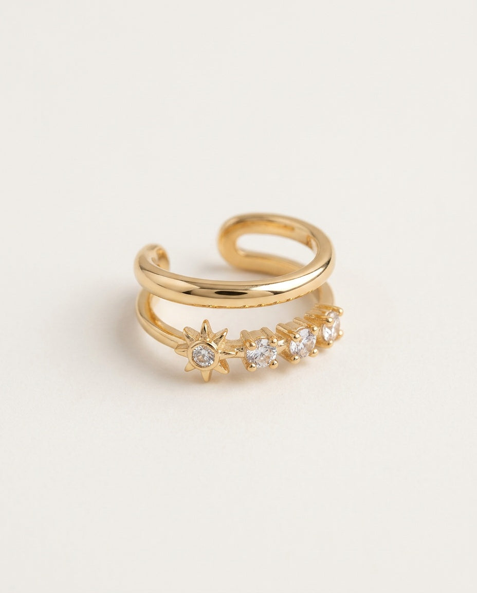 Star ear cuff with a line of stones ending in a star, packshot