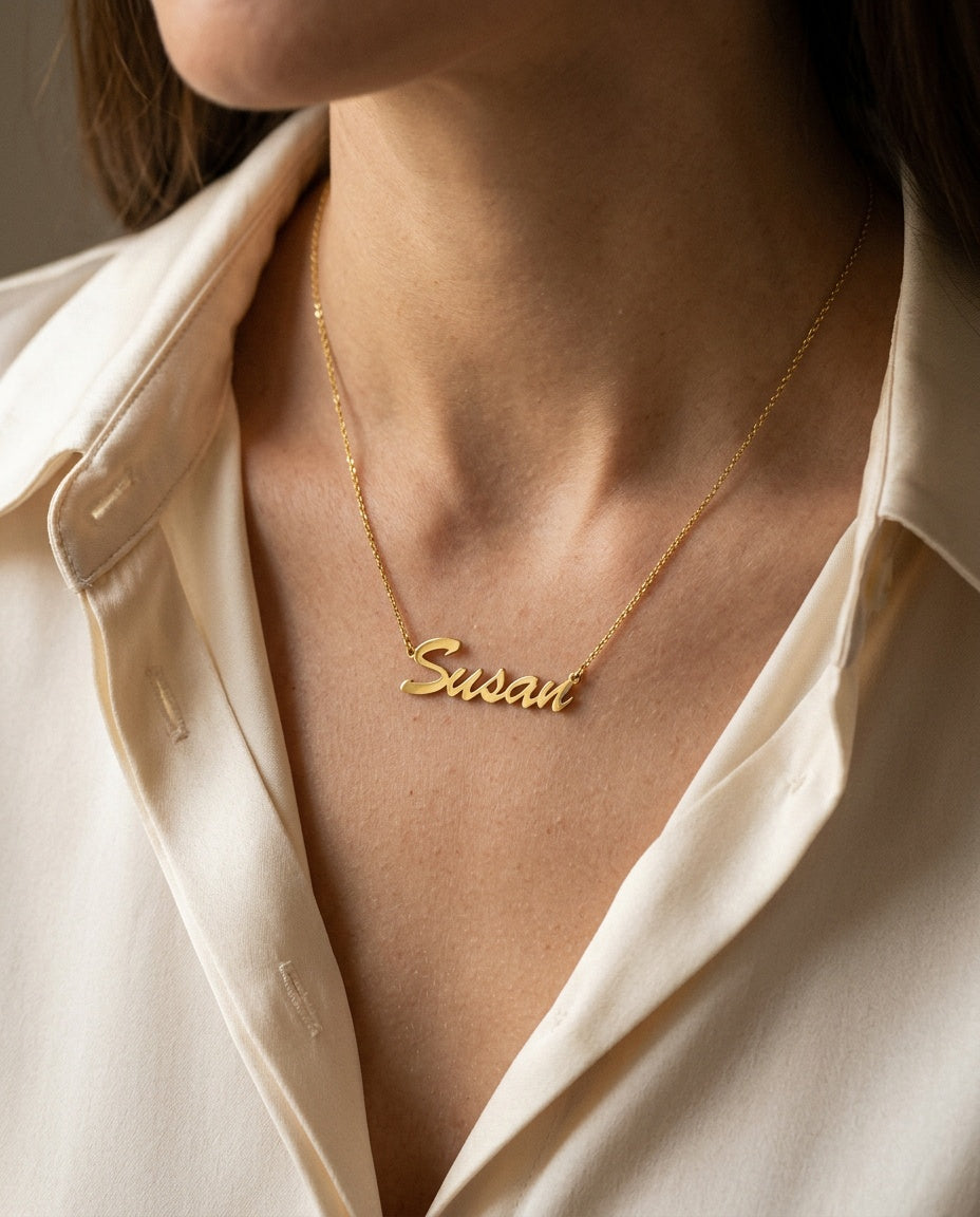 Personalized name necklace worn at the collarbone