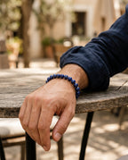 Lapis lazuli bracelet worn on a man's wrist