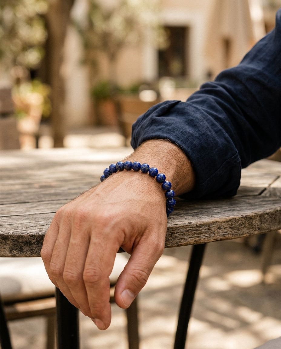 Lapis lazuli bracelet worn on a man's wrist