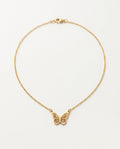 Collier papillon doré avec pendentif aux ailes ajourées