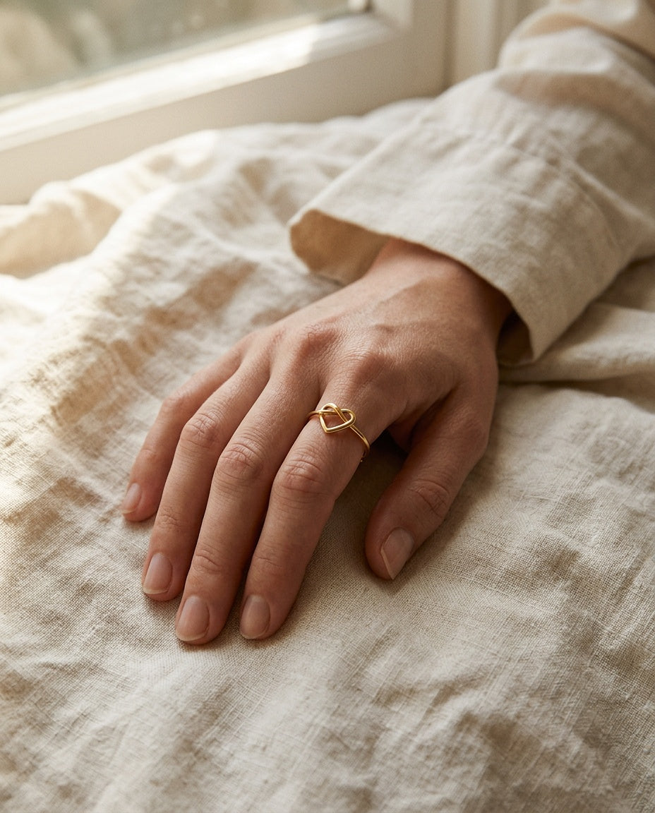 Women heart ring worn on the index finger