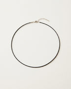 Black choker in thin waxed cord with stainless steel clasp