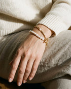 Pearl bracelet worn on the wrist with a toggle clasp on top