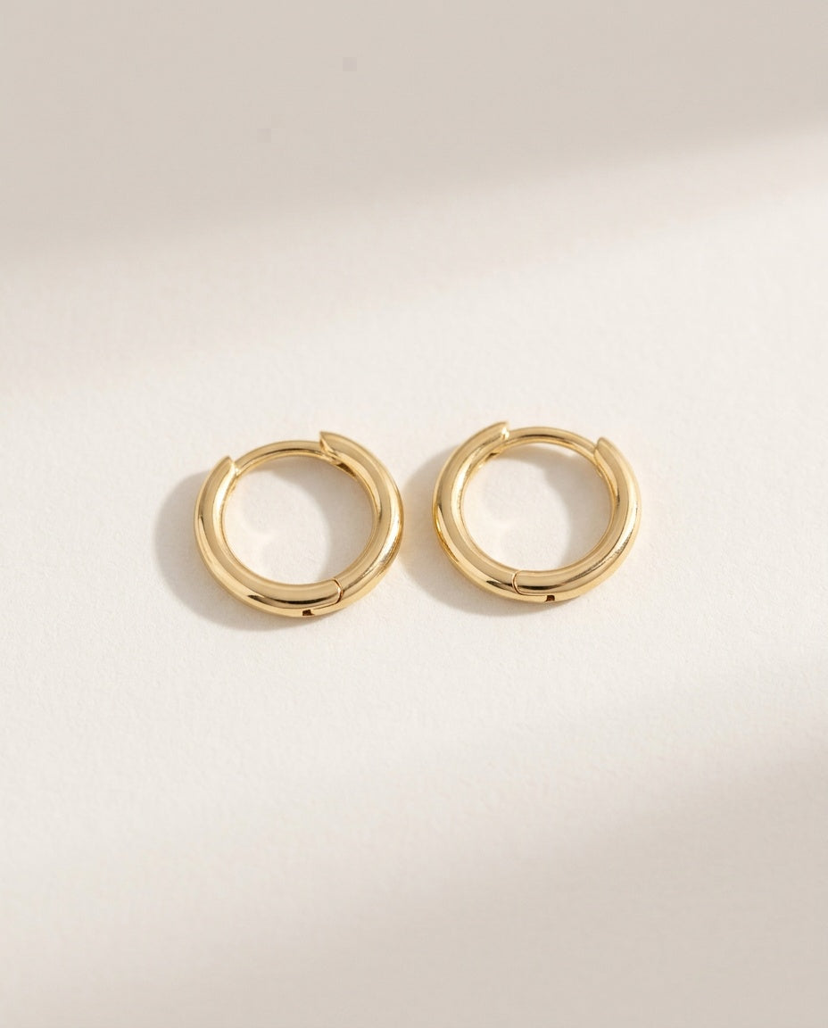 Gold huggie earrings, small smooth round hoops