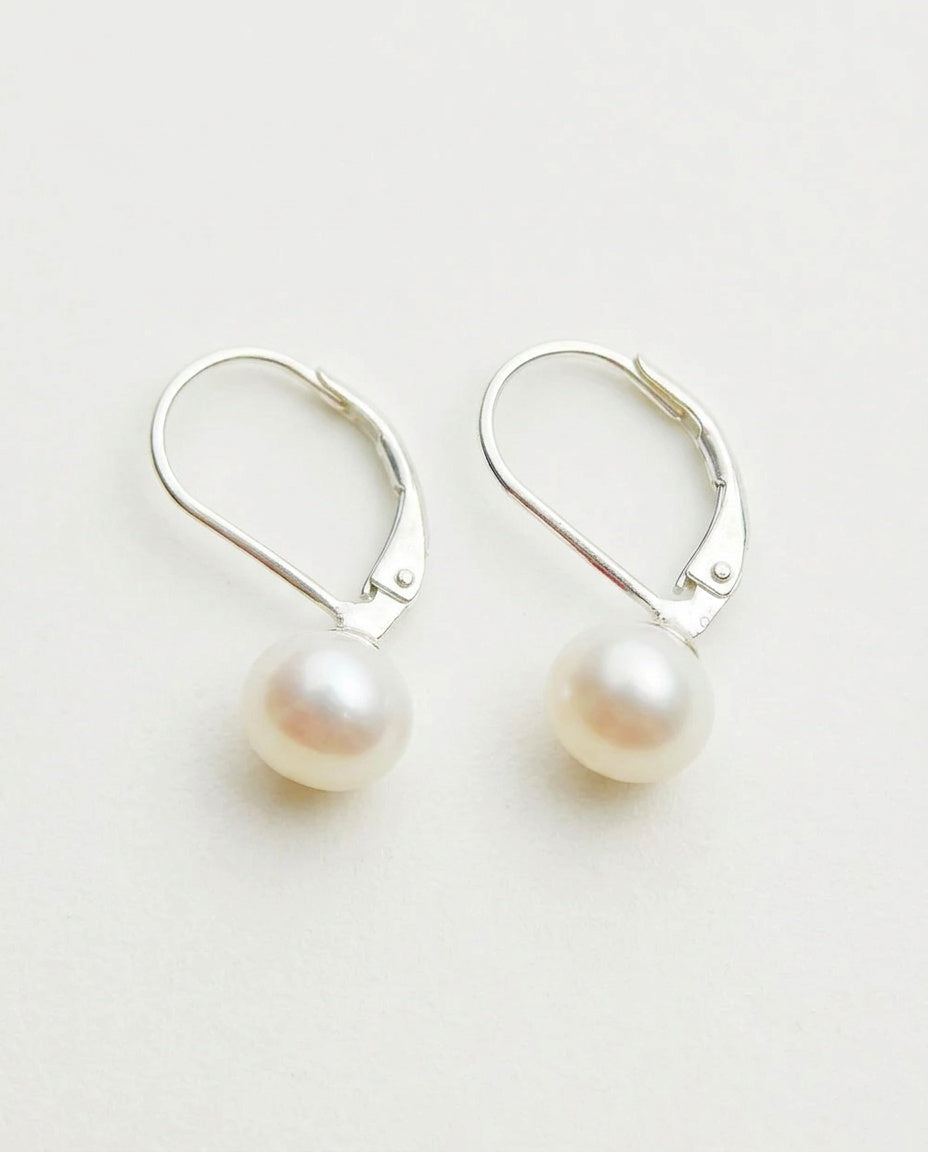 Leverback earrings with white freshwater pearls on sterling silver