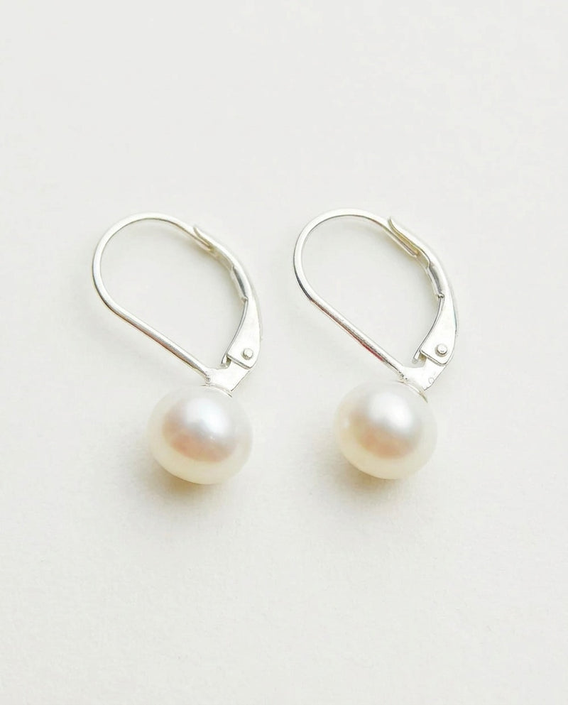 Leverback earrings with white freshwater pearls on sterling silver
