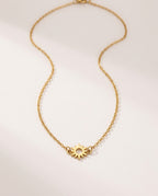 Collier soleil doré avec pendentif soleil spirale