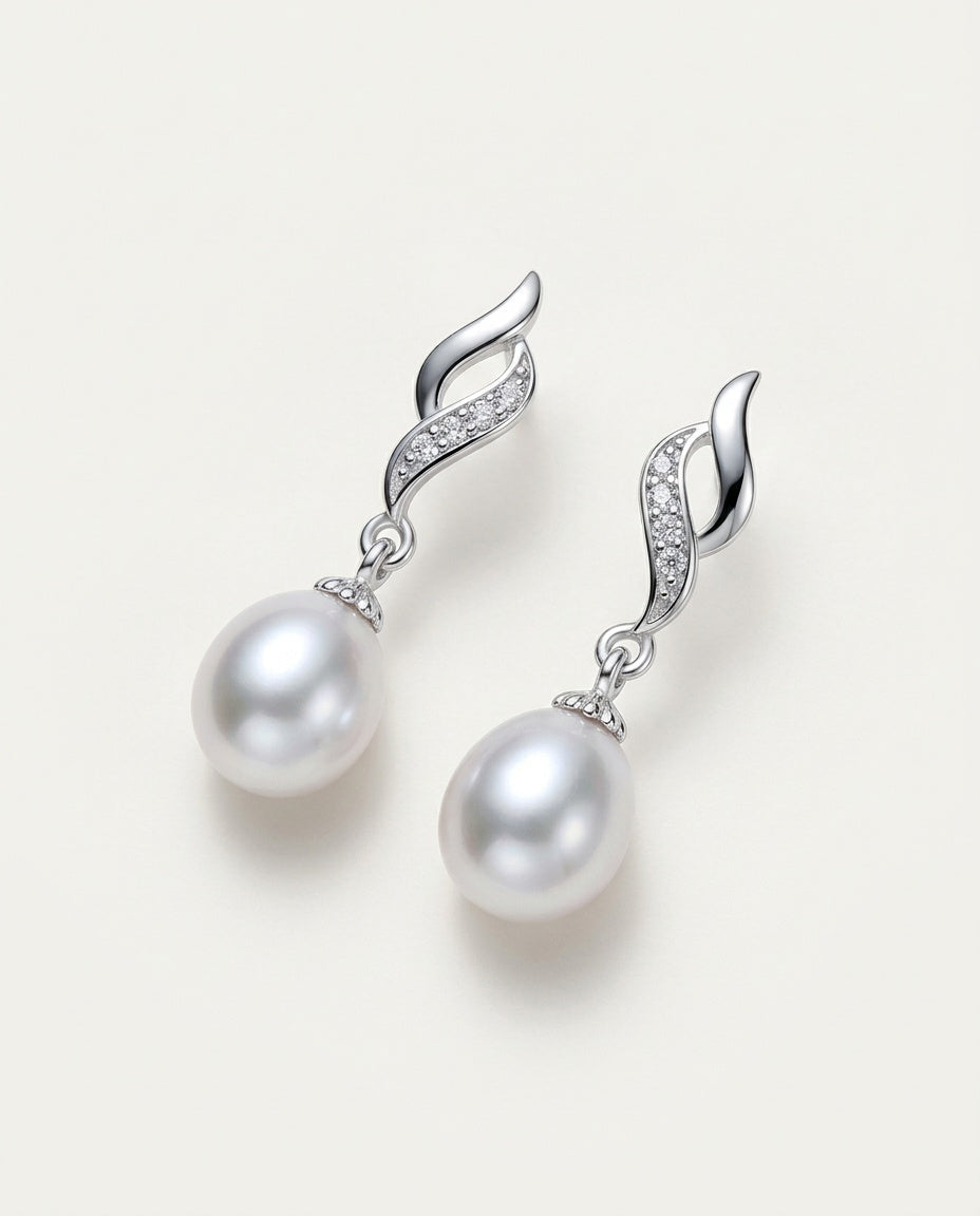 Pearl drop earrings in sterling silver with white freshwater pearls