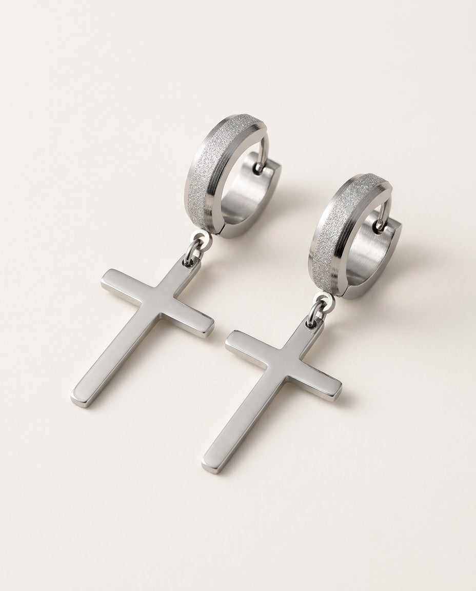 Cross earrings for men, stainless steel cross on a huggie hoop, packshot